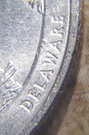 2015--Delaware-Quarter-Error-DD?